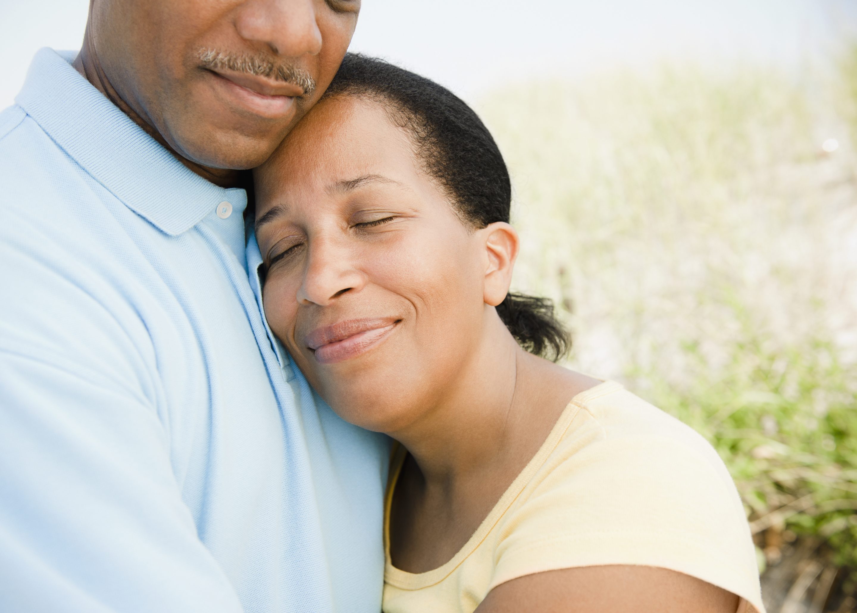 a man and woman couple hugging