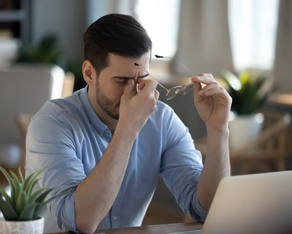 Burned-out man at his desk
